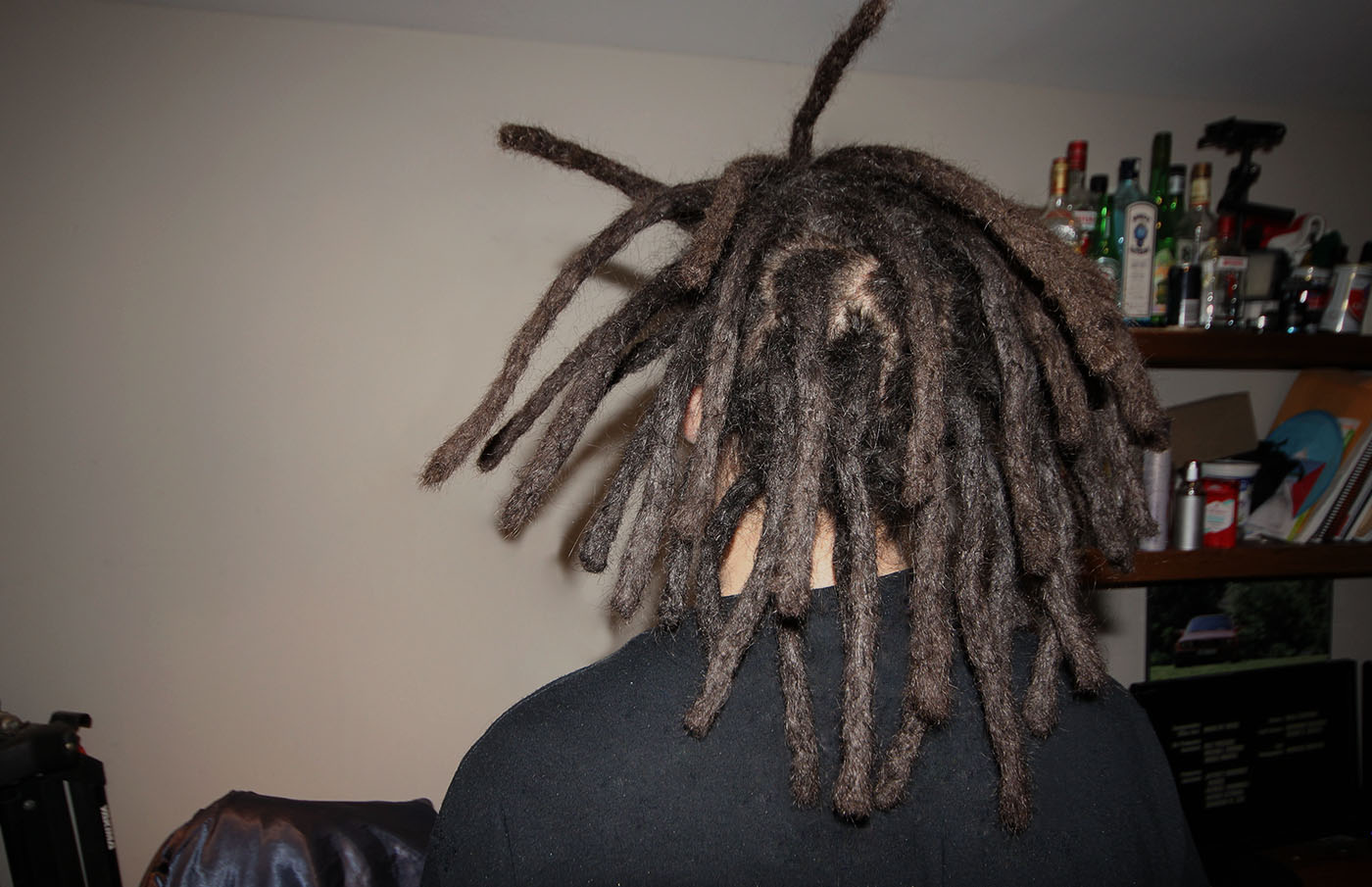 White dude dreadlocks scene from the back of his head. Dreads MTL
